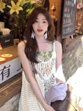 YESMYTOOL  -  2024 Summer New Dresses Female Beach Holiday Floral Suspender Dress For Women's With Unique Design Tassels Long Party Dresses.