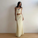 YESMYTOOL  -  2024 Spring New Women's Clothing Solid Color Slim Fit Exposed Navel Strap Small Vest High Waisted Skirt Set